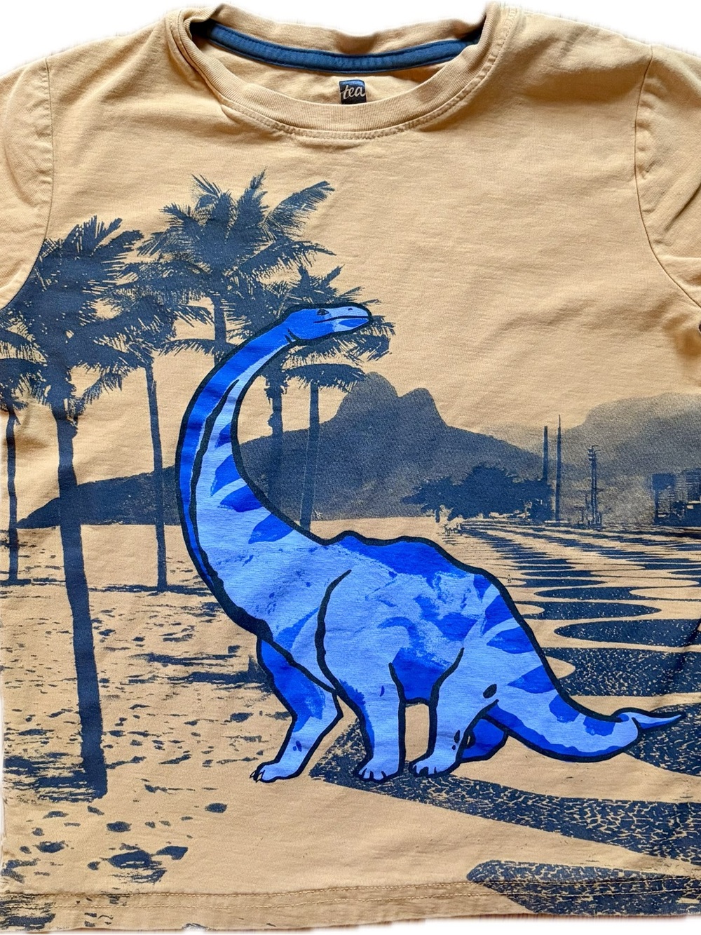 Tea Collection Tan Tee with Blue Dino Graphic